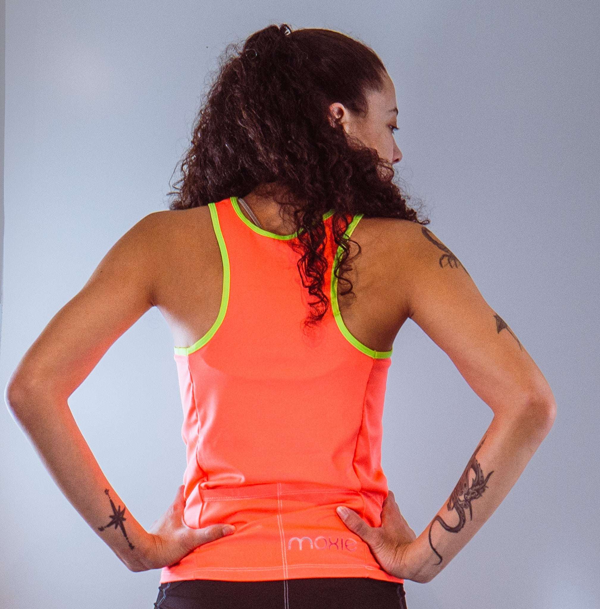 Women's sleeveless bike jersey in high visibility, featuring Fun Bike Luv graphic and back pocket, perfect for cycling.
